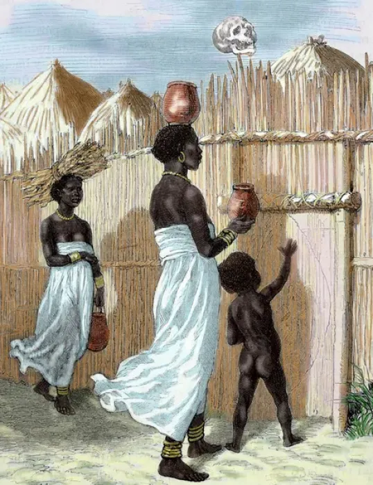 Framed Print : Africa. Two women and a child entering in the village