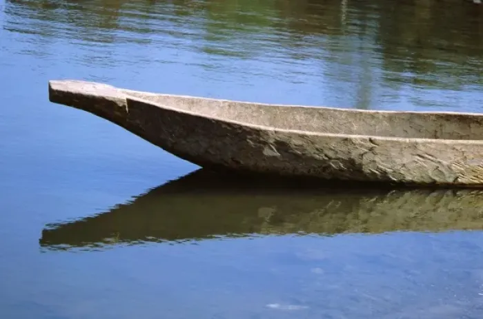 Framed Print : Africa, Zambia, Zambezi River. Dugout canoe
