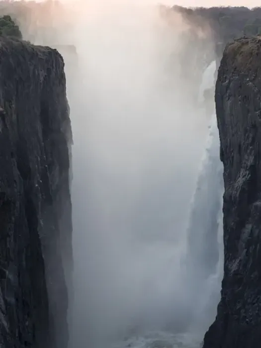 Framed Print : Africa, Zimbabwe, Victoria Falls. Waterfall and spray at sunrise