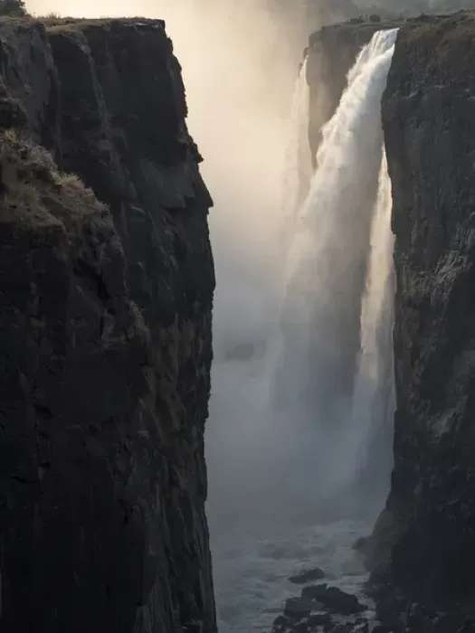 Framed Print : Africa, Zimbabwe, Victoria Falls. Close-up of waterfall and spray at sunrise. Credit as Framed Print : Africa, Zimbabwe, Victoria Falls. Close-up of waterfall and spray at sunrise. Credit as