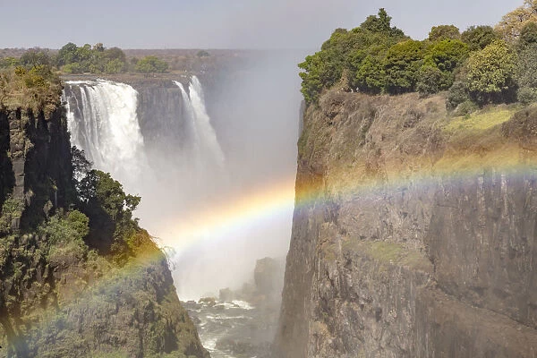 Africa, Zimbabwe, Victoria Falls. Rainbow at Victoria Falls