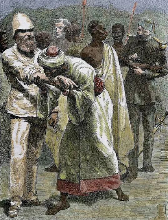 Framed Print : African native kissing the arm of an European settler. Colored engraving of 1887