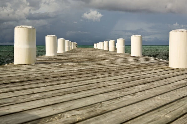 Afternnon light and dark clouds on dock in Blue Hills, Provodenciales, Turks and Caicos