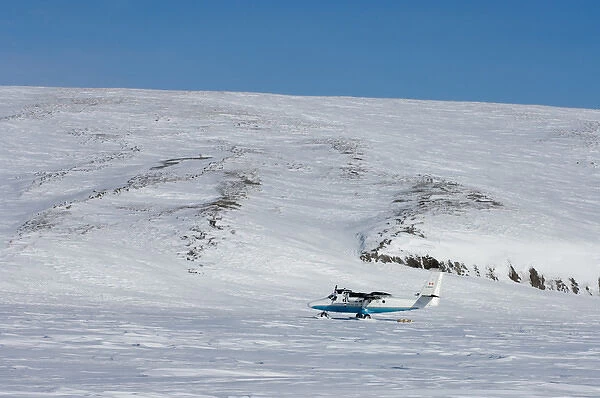 airplane dropping off supplies on Herschel Island, off the Mackenzie River delta