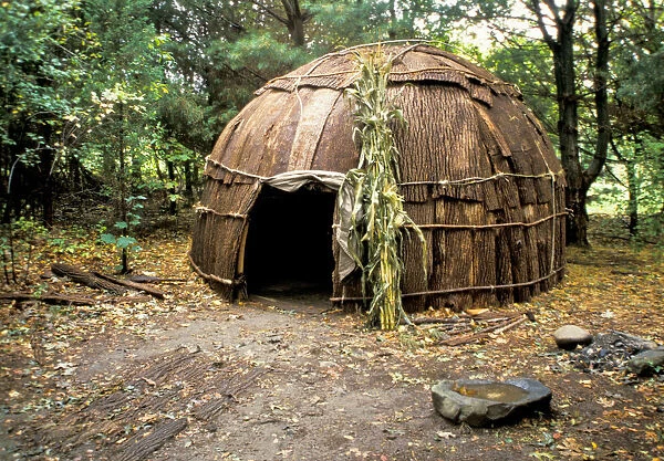 The Algonkin Indians lived in bark covered dwellings called wigwams. Their houses