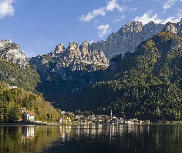 Alleghe at Lago di Alleghe under the peak of Civetta, an icon of the dolomites in the