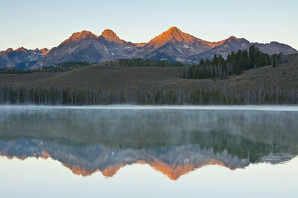 Alpenglow; sunrise; reflections; Little Redfish Lake; Sawtooth National Forest; Stanley