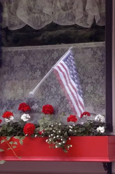Framed Print : American flag and flower box Framed Print : American flag and flower box