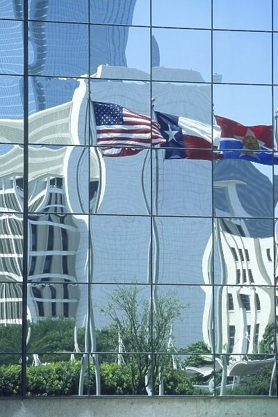 American and Texas state flags reflecting in hotel windows, Dallas, Texas