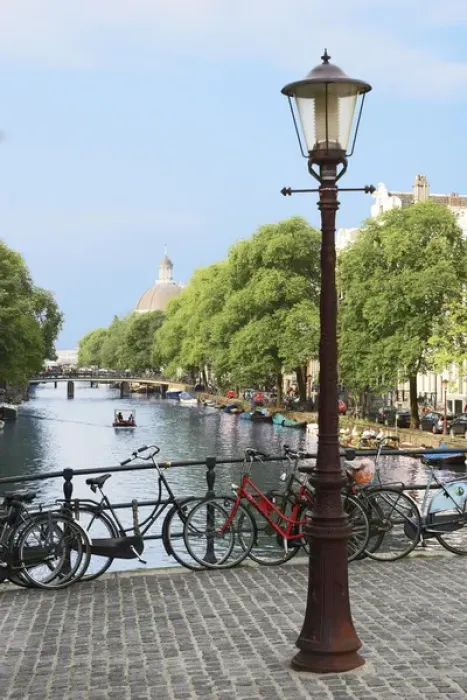 Framed Print : Amsterdam, Holland, Old gas lamp post and bicycles on a bridge over a canal in Framed Print : Amsterdam, Holland, Old gas lamp post and bicycles on a bridge over a canal in