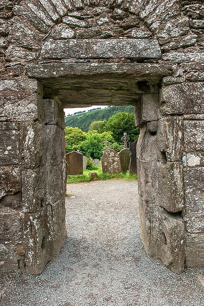 Ancient door marks the passageway between the old church and graveyard at Glendalough Monastery