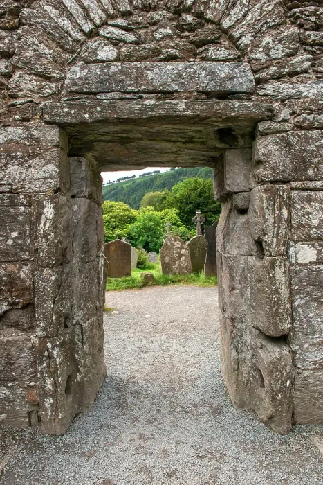 Framed Print : Ancient door marks the passageway between the old church and graveyard at Glendalough Monastery Framed Print : Ancient door marks the passageway between the old church and graveyard at Glendalough Monastery