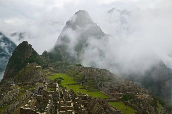 Ancient ruins of Machu Picchu with Andes Mountain, Peru