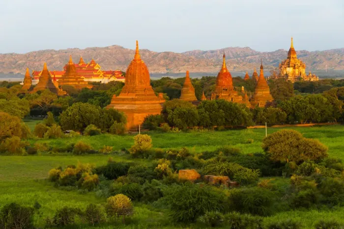 Framed Print : Ancient temple and pagoda rising out of the jungle at sunrise, Bagan, Mandalay Region Framed Print : Ancient temple and pagoda rising out of the jungle at sunrise, Bagan, Mandalay Region