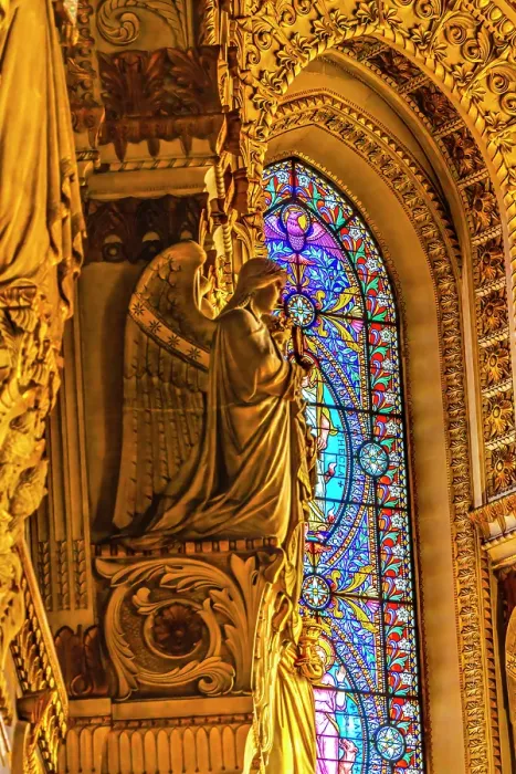 Framed Print : Angel statue colorful stained glass, Basilica of Notre Dame de Fourviere, Lyon, France. Built from 1872 to 1896. (Editorial Use Only) Framed Print : Angel statue colorful stained glass, Basilica of Notre Dame de Fourviere, Lyon, France. Built from 1872 to 1896. (Editorial Use Only)