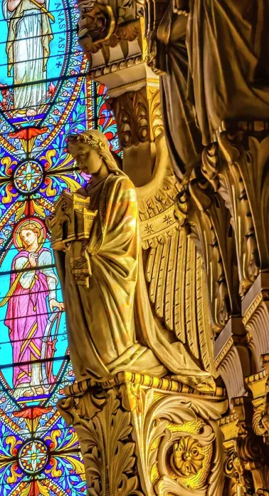 Framed Print : Angel statue colorful stained glass, Basilica of Notre Dame de Fourviere, Lyon, France. Built from 1872 to 1896. (Editorial Use Only)