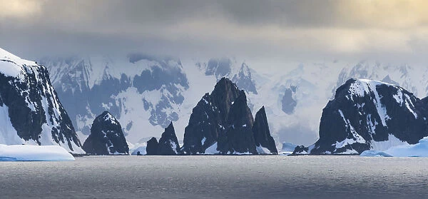 Antarctic Peninsula, Antarctica, Spert Island. Craggy rocks and mountains