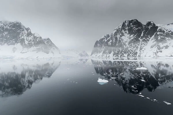 Antarctica, Antarctic Peninsula, Lemaire Channel. Mountain reflection