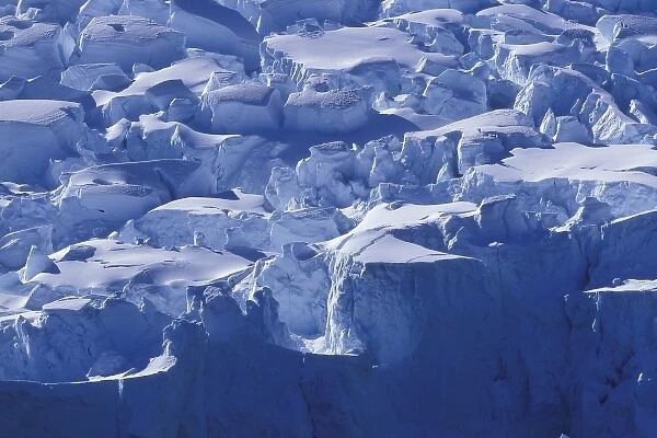 Antarctica, Livingston Island, Heavily crevassed tidewater glaciers line coastline