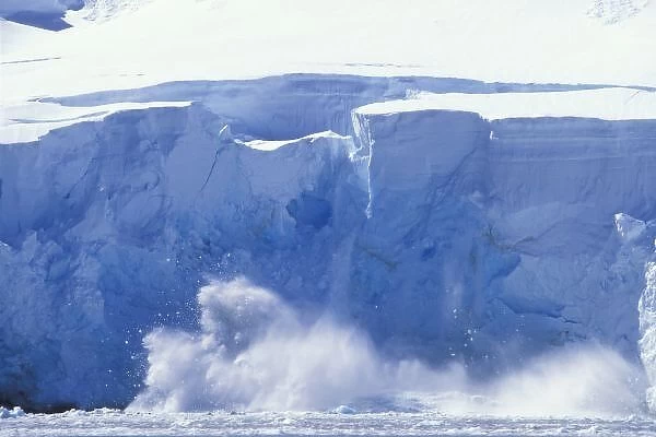 Antarctica, Paradise Bay, Massive wave forms as icebergs calve from tidewater glacier