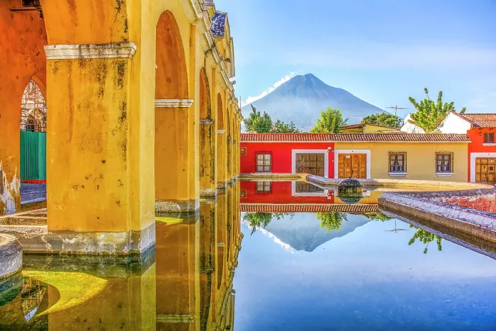 Framed Print : Antigua, Guatemala. Wide angle landscape view of 18th Century public wash basins with Volcan Agua in the background Framed Print : Antigua, Guatemala. Wide angle landscape view of 18th Century public wash basins with Volcan Agua in the background