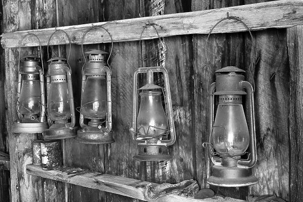 Antique lanterns, Bodie State Historic Park viewed through window, California