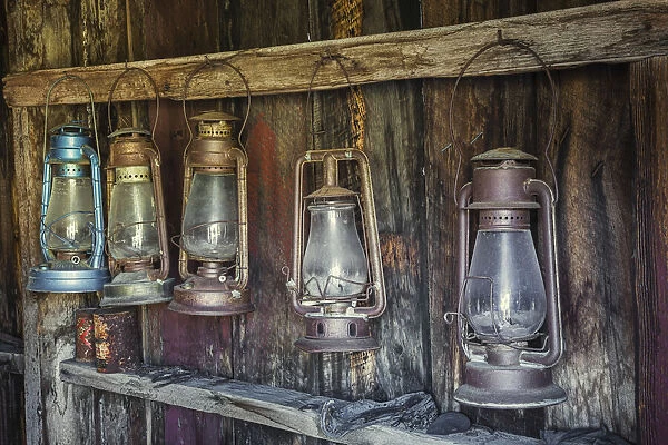 Antique lanterns, Bodie State Historic Park viewed through window, California