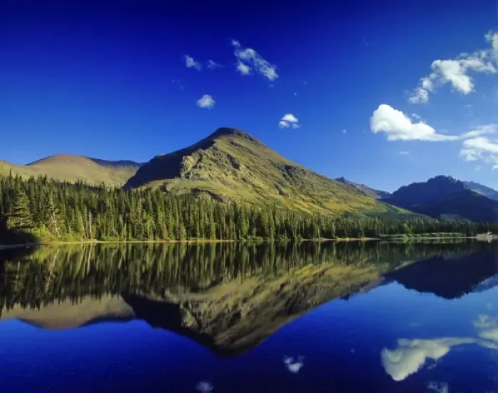 Framed Print : Appistoki Peak reflects into Pray Lake in the Two Medicine Valley of Glacier National Park Framed Print : Appistoki Peak reflects into Pray Lake in the Two Medicine Valley of Glacier National Park