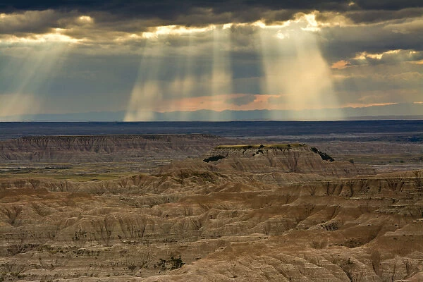 approaching storm and crepuscular rays, sunset, Pinnacles Viewpoint, Badlands National Park