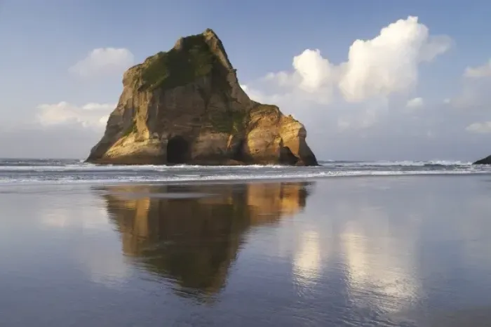 Framed Print : Archway Islands Reflected in Wet Sands of Wharariki Beach, near Cape Farewell, North Framed Print : Archway Islands Reflected in Wet Sands of Wharariki Beach, near Cape Farewell, North