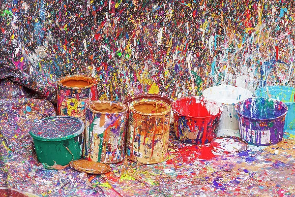 Argentina, Buenos Aires. Colorful paint splatters and buckets