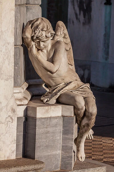 Argentina, Buenos Aires. Statue of an angel at the entrance to a tomb in Recoleta Cemetery