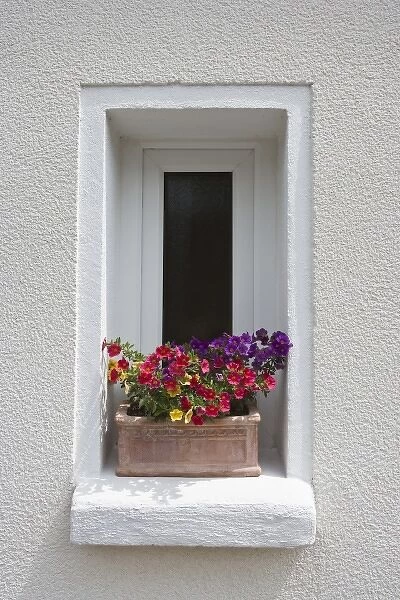 Arnsberg, Germany. Colorful flowers fill window boxes at houses