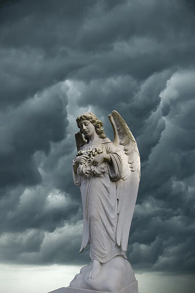 Artistic creation of angel and dark clouds