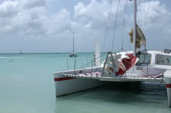 Framed Print : 01. Aruba, Palm Beach, catamaran on beach