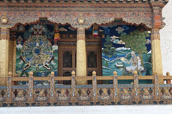 Asia, Bhutan. Paintings and detailed woodwork near entrance to temple in Punakha Dzong palace