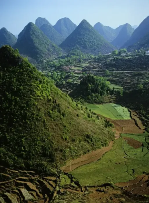 Framed Print : Asia, China, Guizhou Province, Xingyi. Limestone karst mountains surround farm fields Framed Print : Asia, China, Guizhou Province, Xingyi. Limestone karst mountains surround farm fields