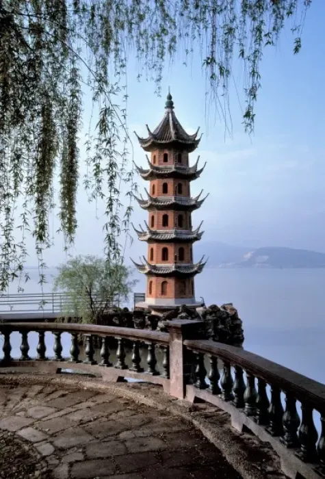 Framed Print : Asia, China, Wuxi. Willow branches frame a miniature pagoda on Lake Tai in Wuxi in China