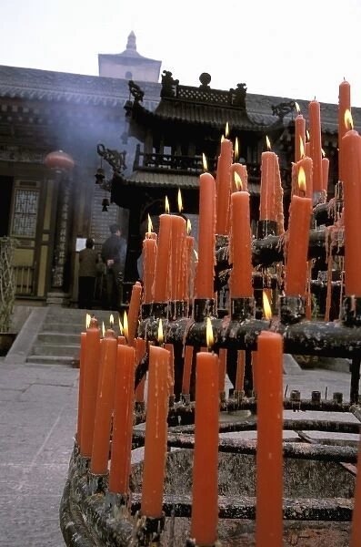 Asia, China, Xian, Big Wild Goose Pagoda. Red candles in front of temple