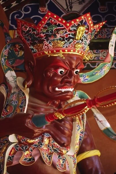 Asia, China, Yunnan, Kunming. Heavenly king Guang Mu Tian statue; Tanghua Monastery