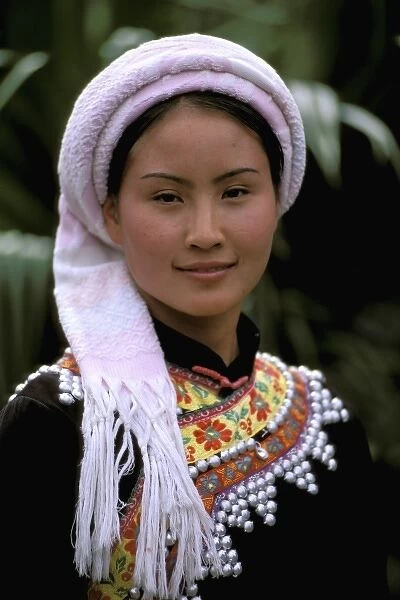 Asia, China, Yunnan Province, Kunming. Yunnan ethnic dancer (MR)
