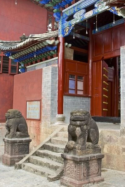 Asia, China, Yunnan Province, Mojiang. Two lion sculptures at the Confucious temple entry gate
