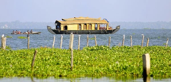 Asia, India, Kerala (Backwaters). A houseboat on Kumarakom Lake