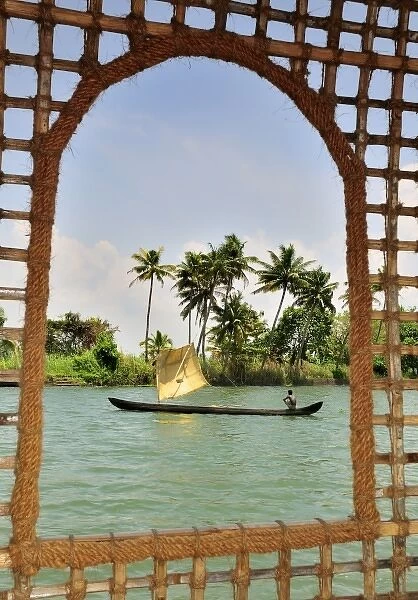 Asia, India, Kerala (Backwaters). A fisherman on the Kerala Backwaters