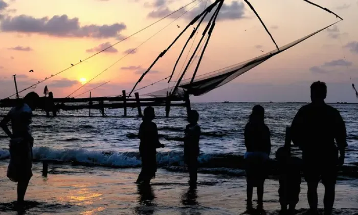 Framed Print : Asia, India, Kerala, Kochi (Cochin). A silhouette of people and a Chinese fishing net