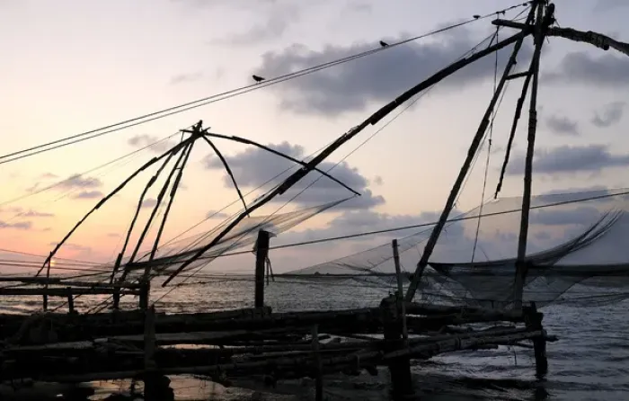 Framed Print : Asia, India, Kerala, Kochi (Cochin). A silhouette of a Chinese fishing net