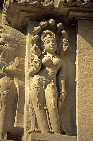 Asia, India, Khajuraho. Erotic carved figures remind visitors to leave sexual or