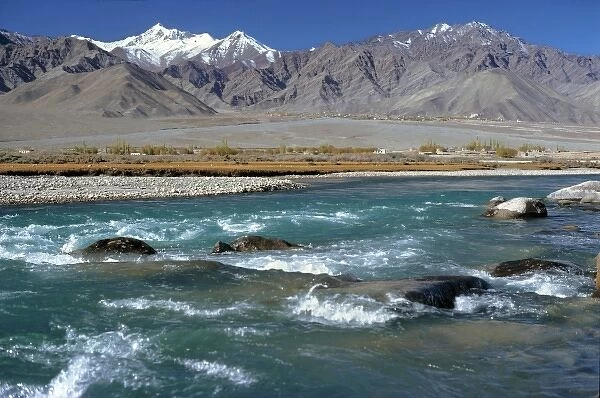 Asia, India, Ladakh, Indus River. The Indus River flows beside the Himalaya range, in Ladakh, India