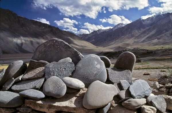 Asia, India, Ladakh, Zanskar Valley. Mani stones, with their smooth sides and carved prayers