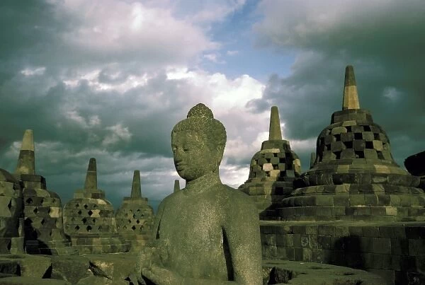 Asia, Indonesia. Temple complex and statue